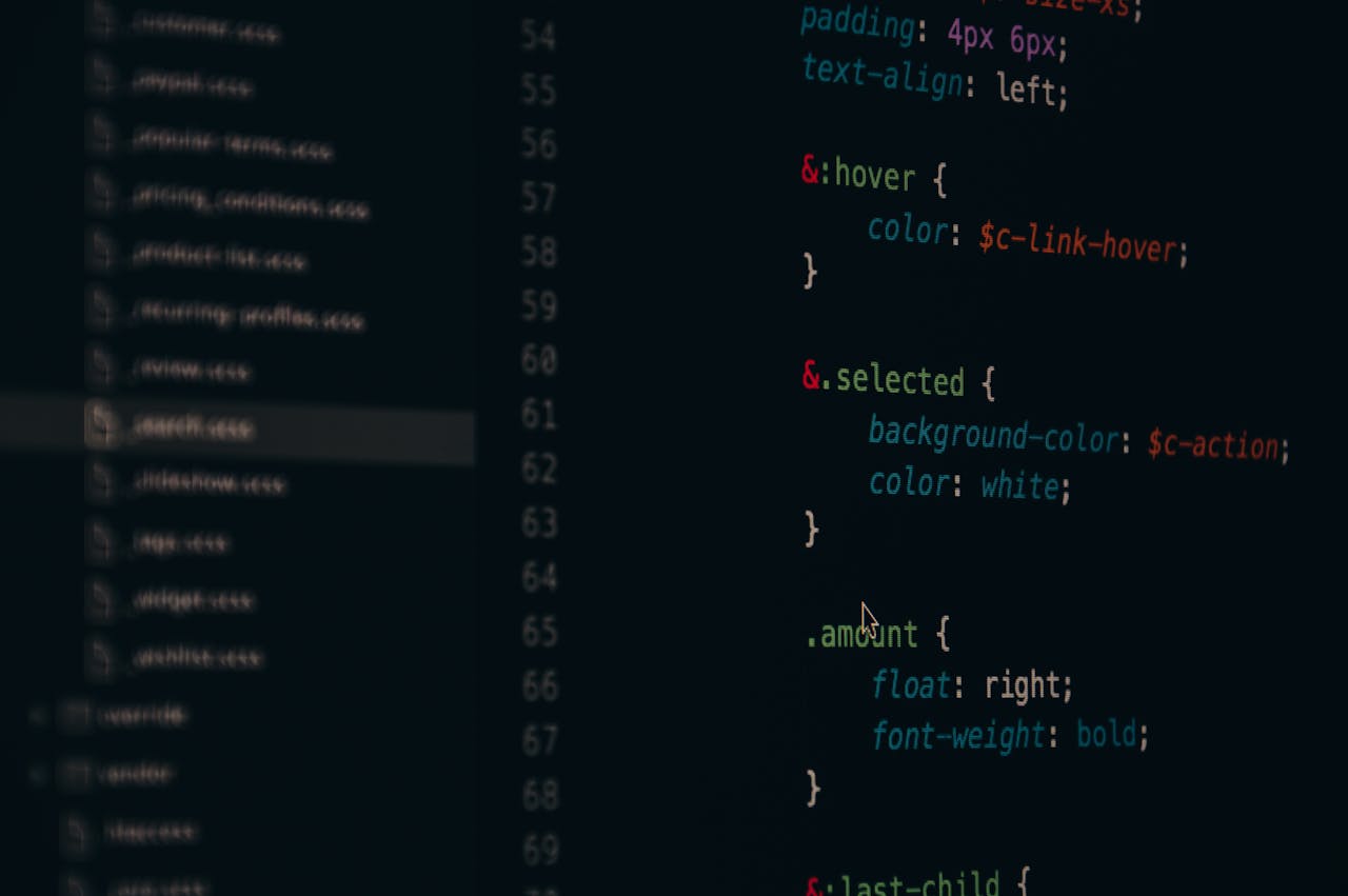 Services Close-up of colorful CSS code lines on a computer screen for web development.